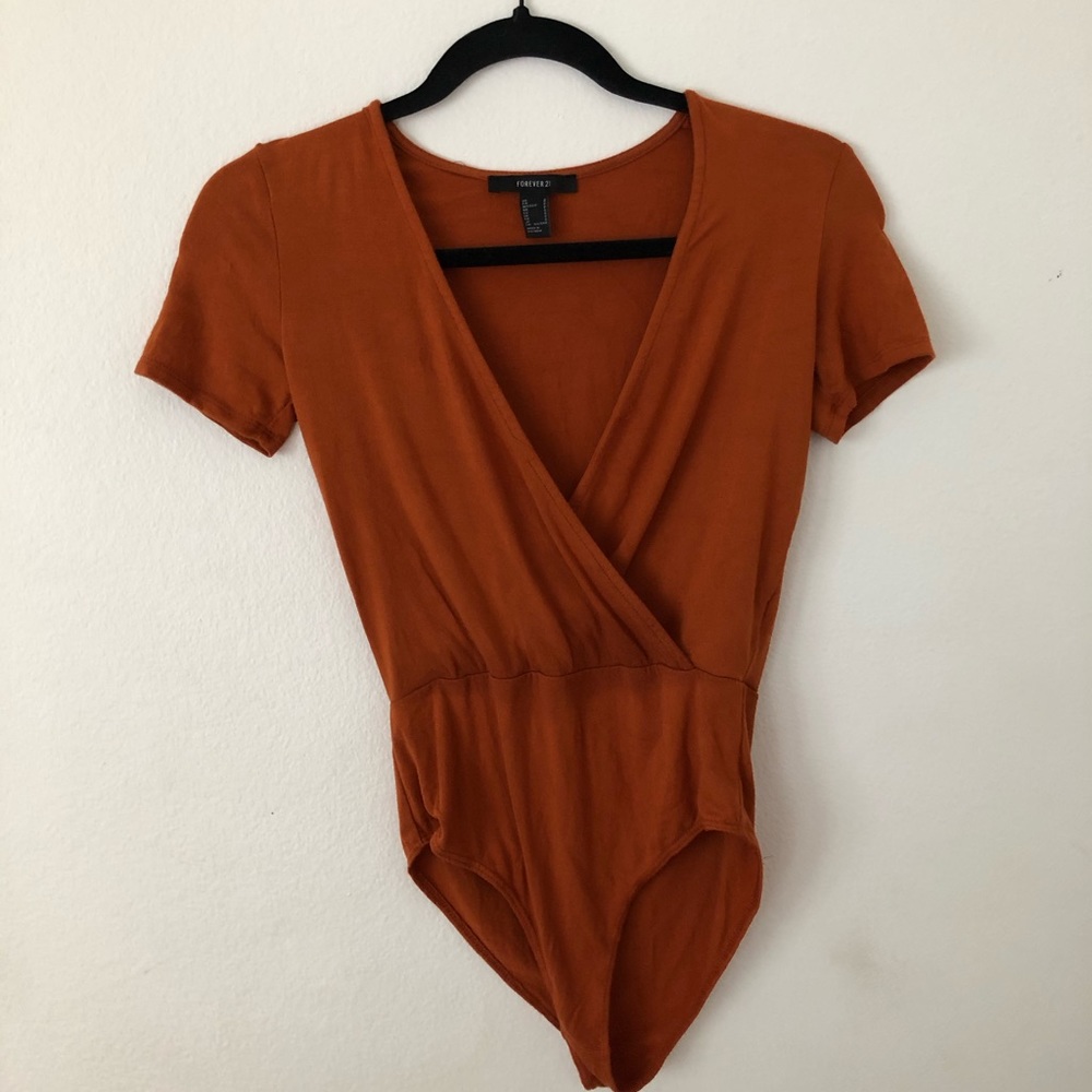 Plunging body suit top